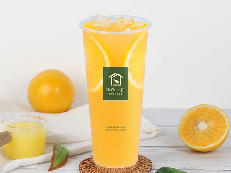 Bright orange Orange Beauty drink with orange slices